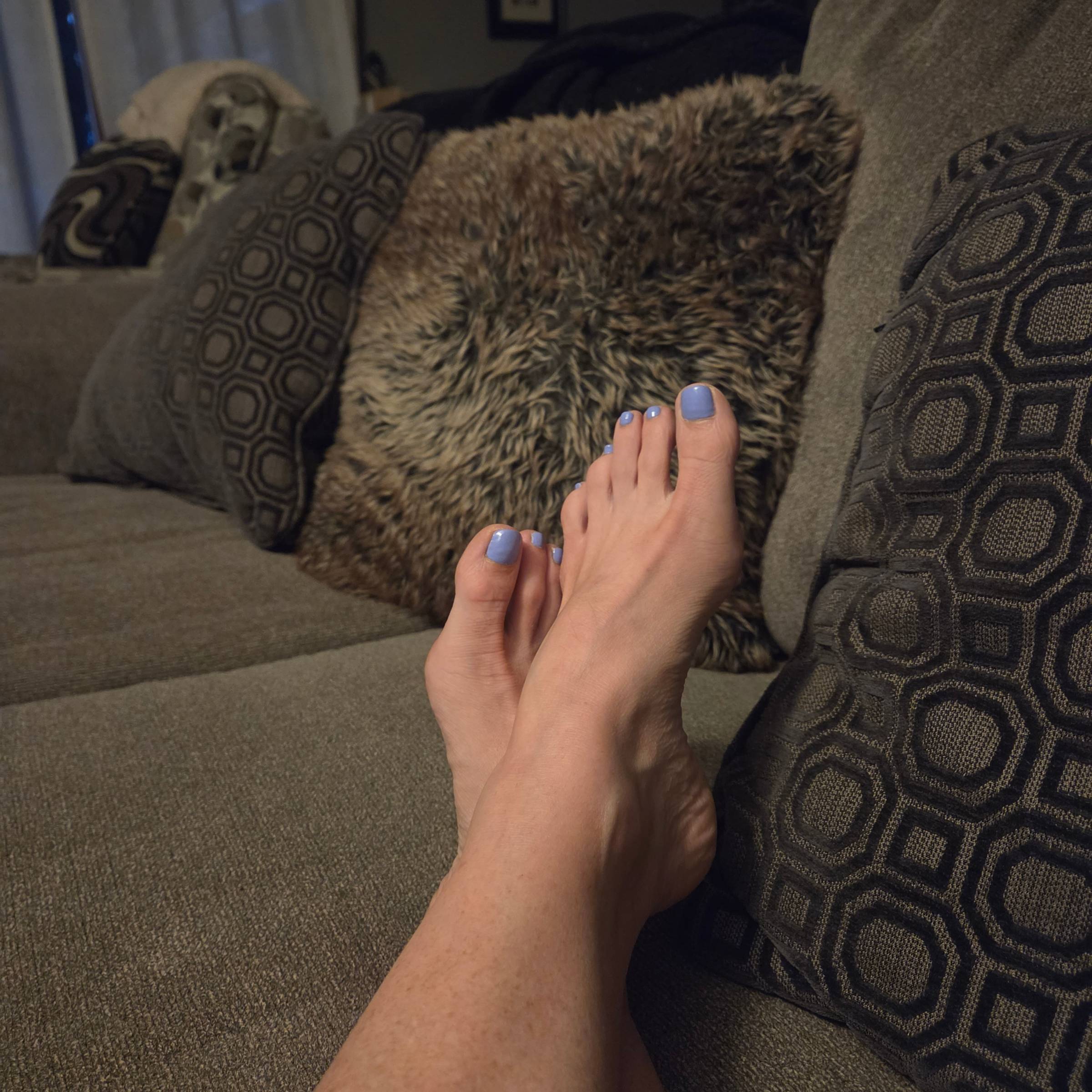 Pedicured feet relaxing