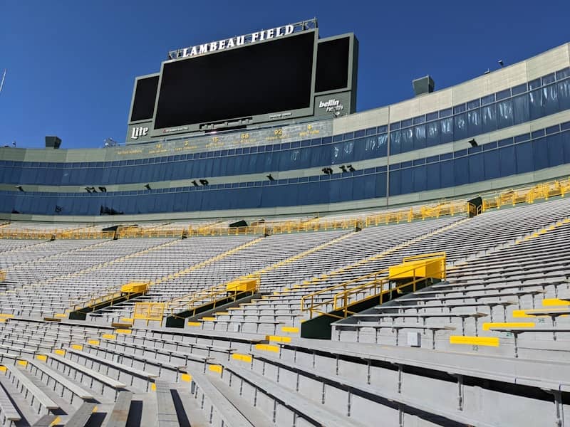 black and white stadium during night time