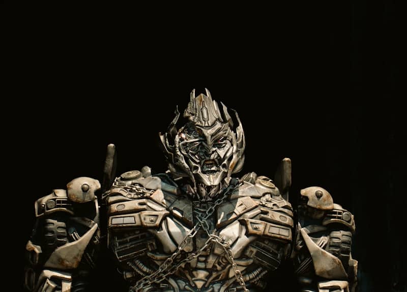 A menacing robot with a detailed metallic face.