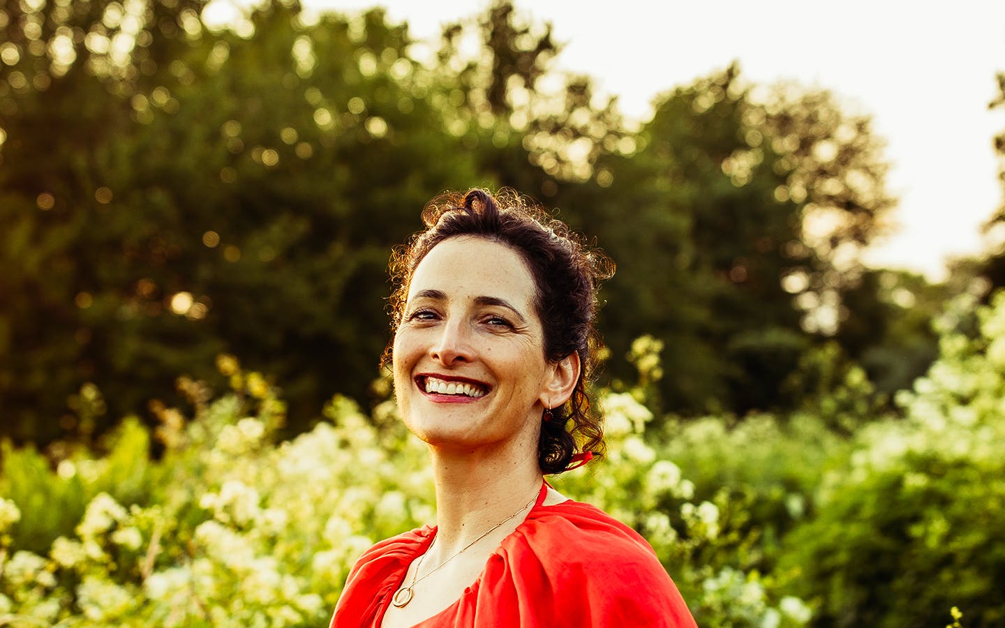 Dr. Catherine in Red Dress in the Garden