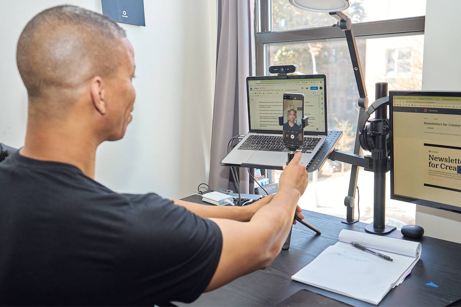Terry Rice, filming at his desk