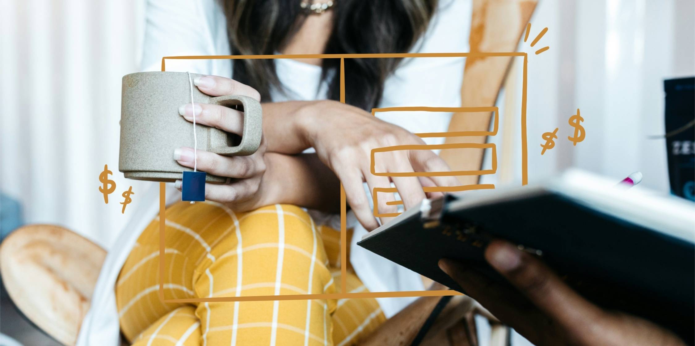 Person holding cup of tea working