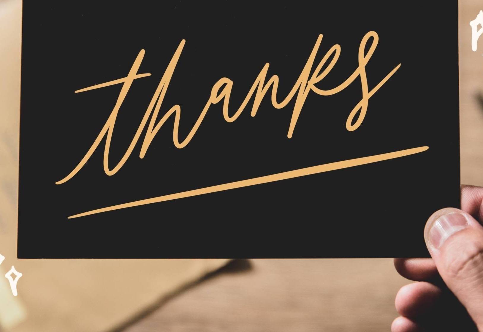 Thanks written on a card