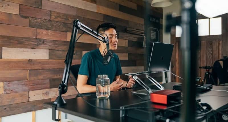 creator speaking into microphone