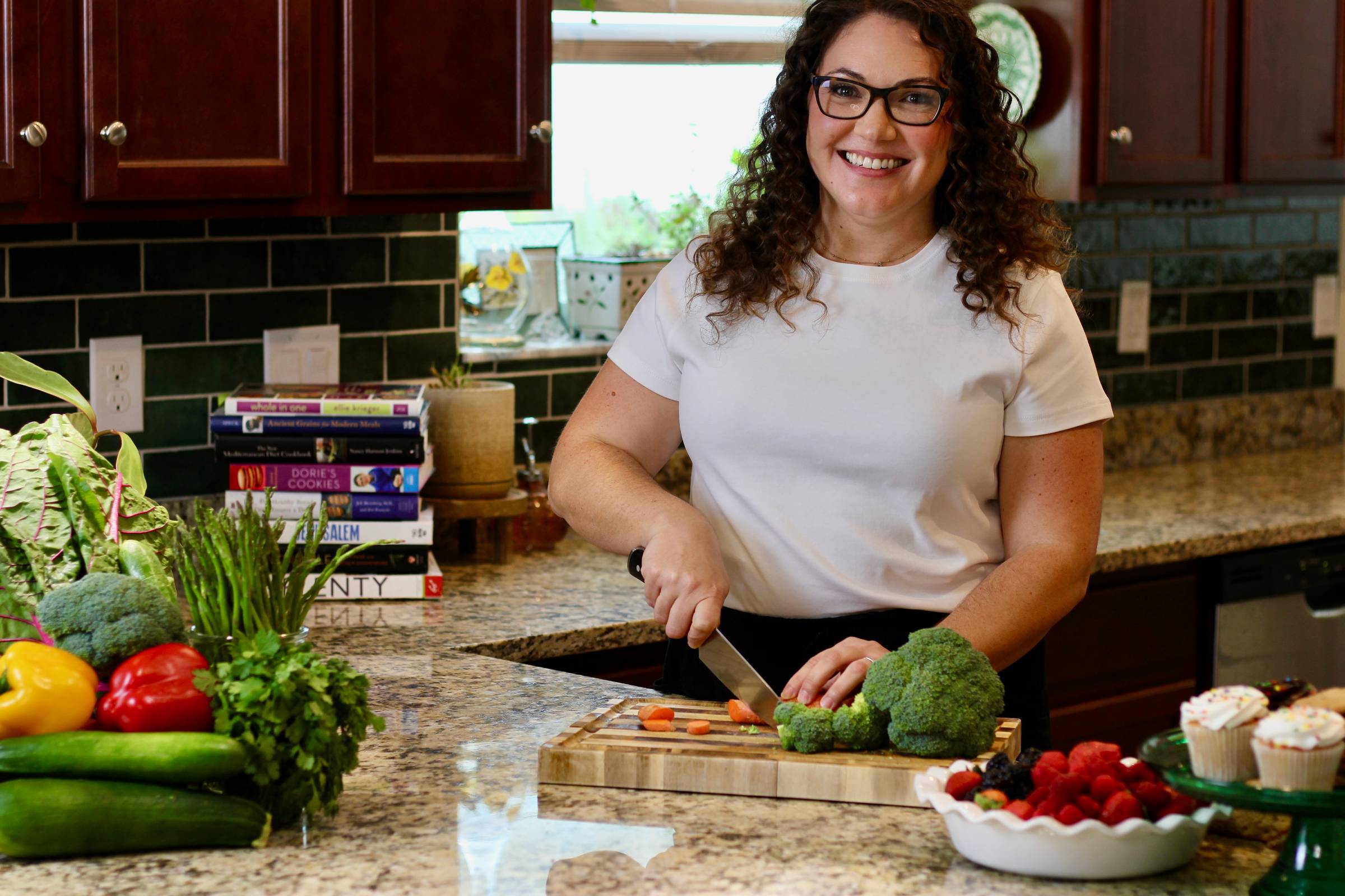 Meggie Connelly, PCOS Dietitian, cooking in her kitchen