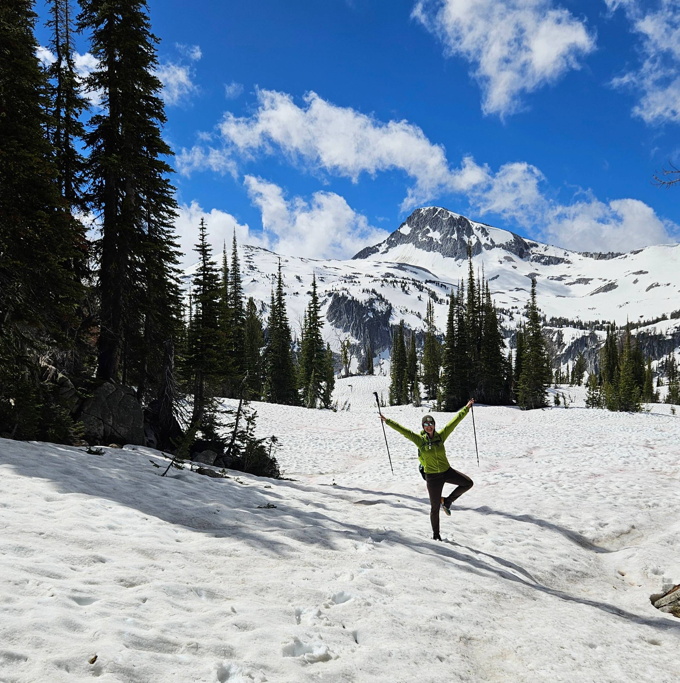 Woman doing yoga in a snowfield