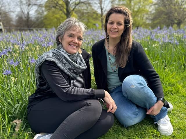 Frances Drost and Kirstin Myers sitting at Kensington Gardens, London UK the day after their Abbey Road an London Symphony recording sessions April 2026.
