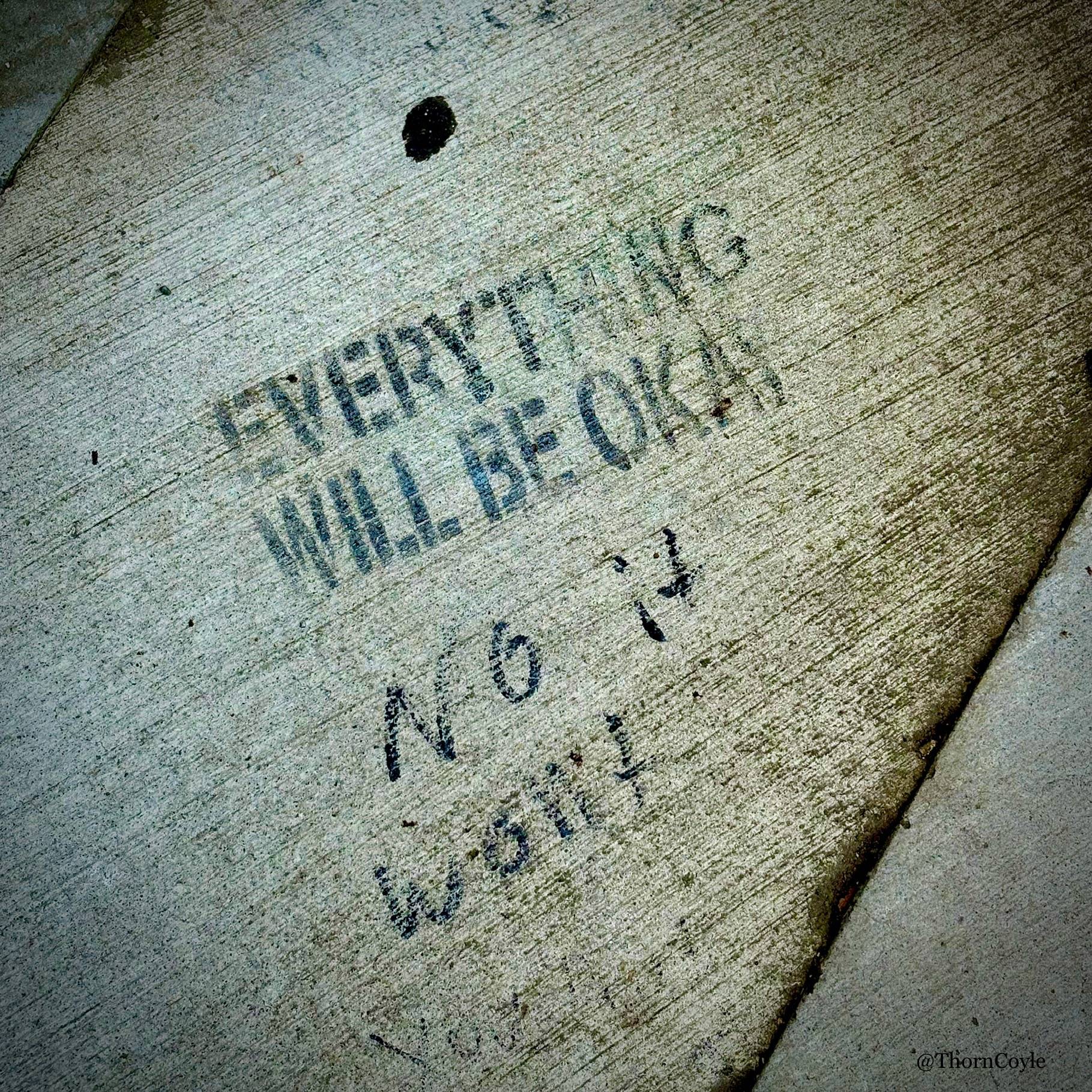sidewalk graffiti: everything will be ok. no it won't.