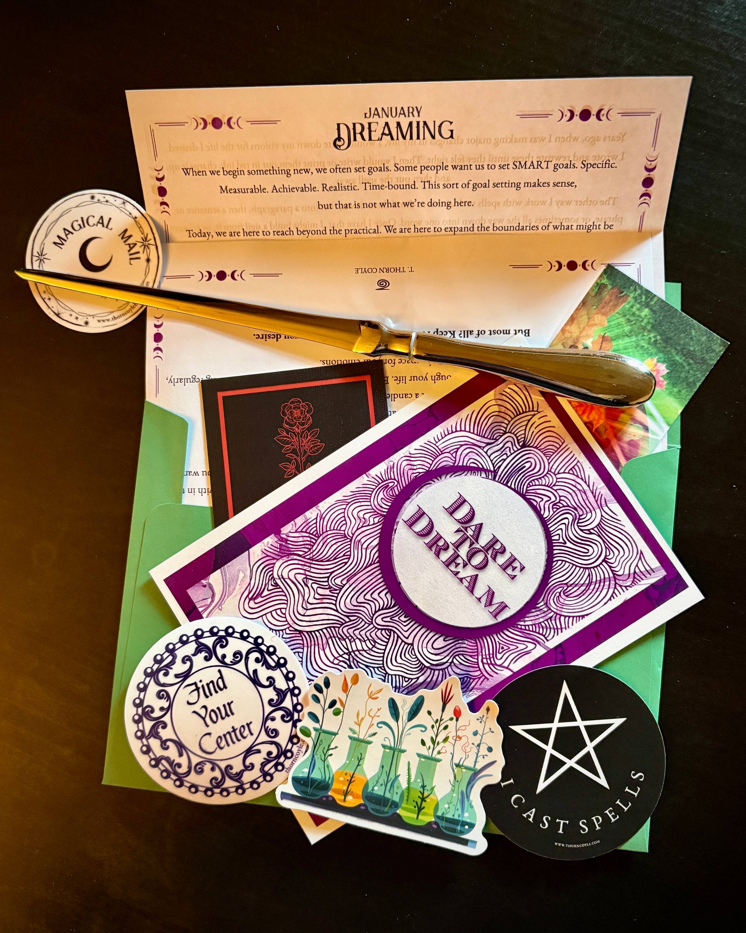 Magical mail packet with spells, and art and stickers