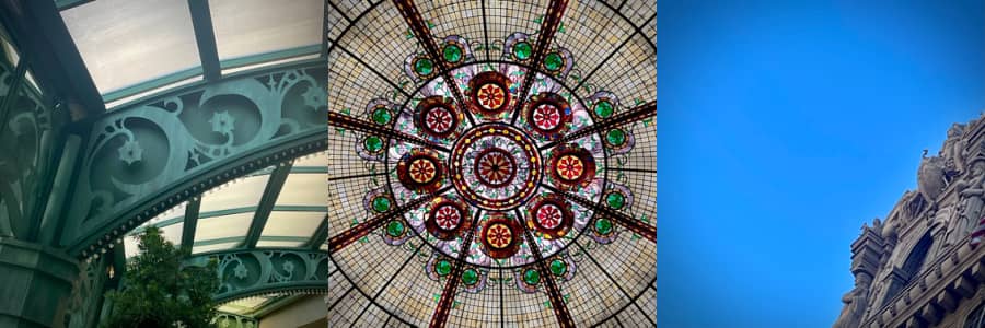 3 photos: a green patina iron structure with flowered scrollwork holding a glass roof, a stained glass ceiling made of different colored circles, blue sky and the top of a beaux arts style stone building.