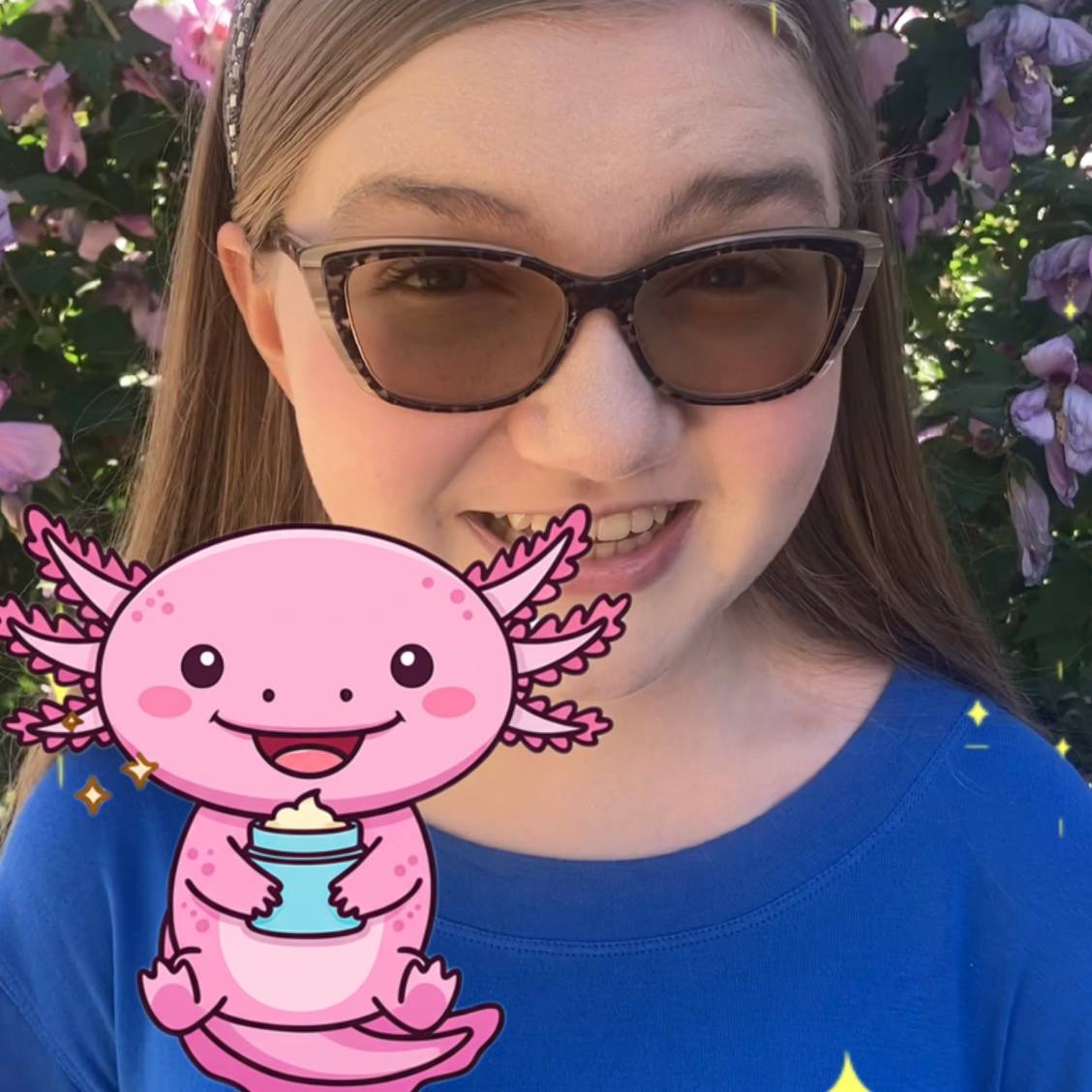 Madeline with an axolotl holding face cream