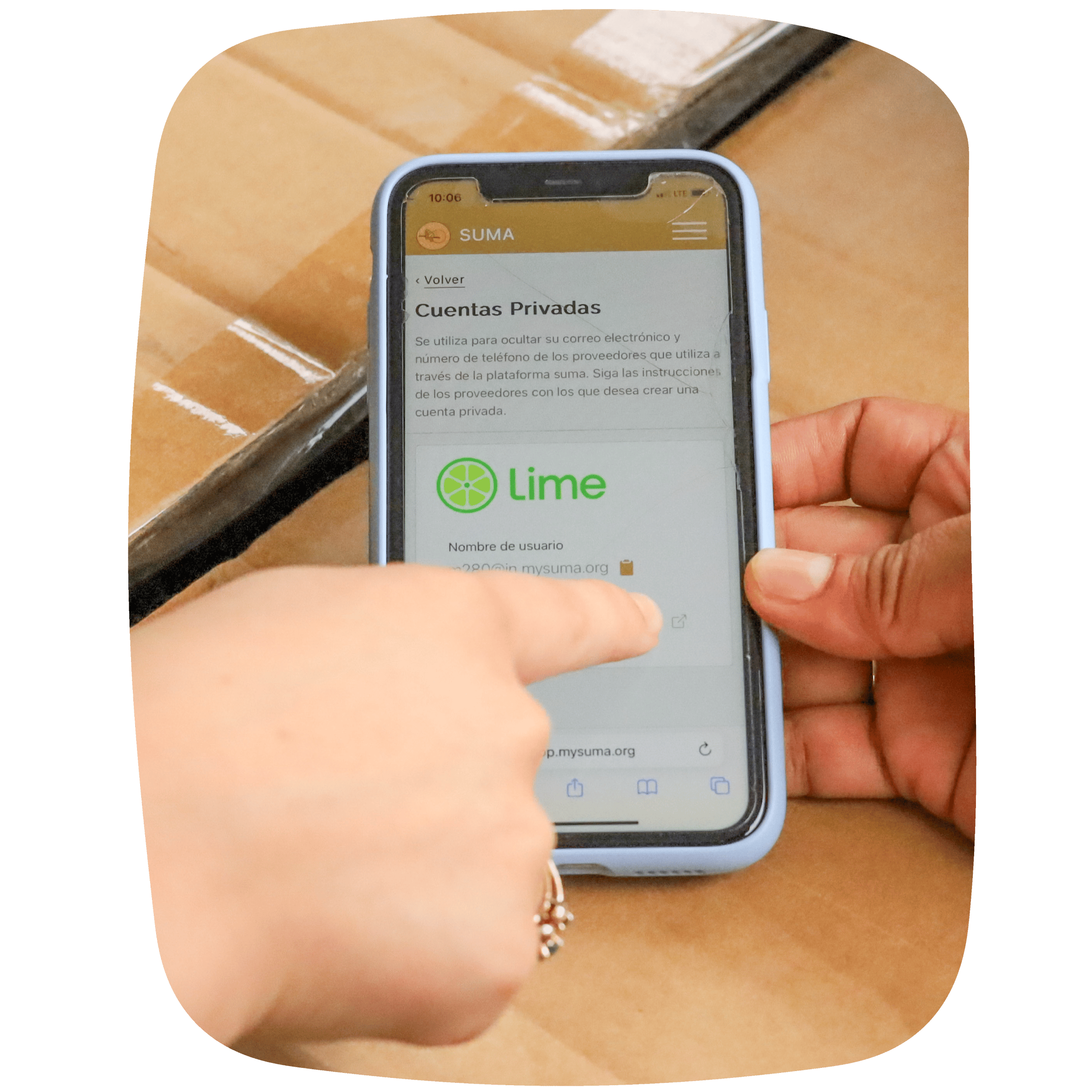 a hand is pointing to a phone screen with the suma app open, "Lime" and it's logo are visible under "Accounts" title