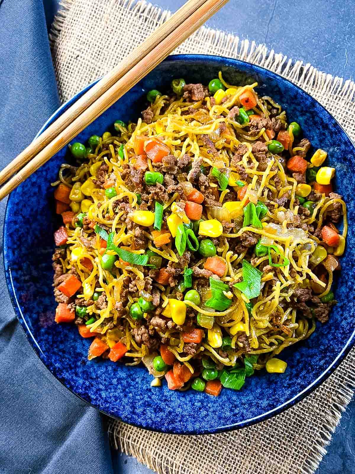 Noodles with ground beef in a bowl.