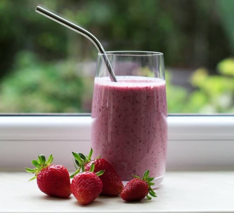 clear drinking glass with red liquid