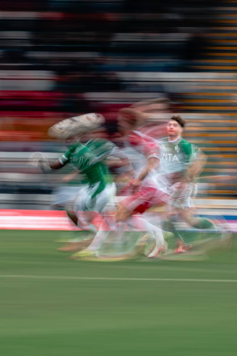 Soccer players in motion on a field