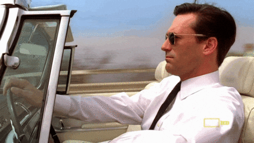John Hamm driving a car in marketing series Mad Men