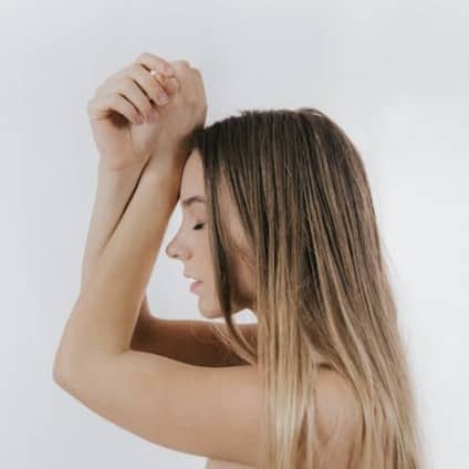 photo of posing blonde-haired woman