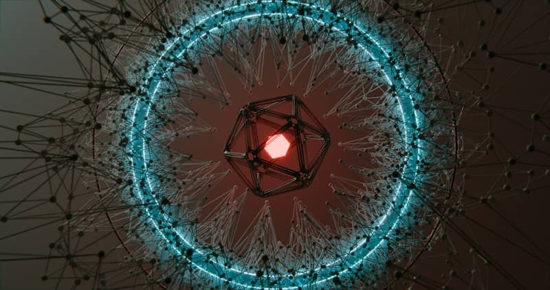 Abstract geometric shape with glowing red center and blue ring