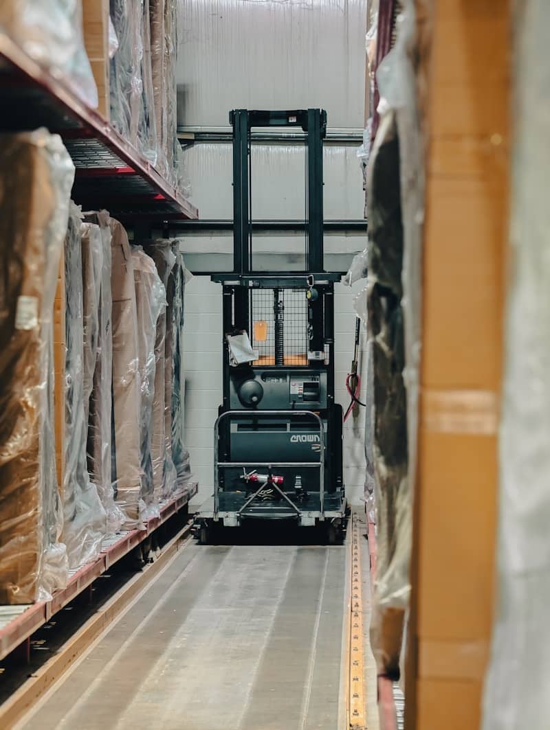 A warehouse filled with lots of boxes and pallets