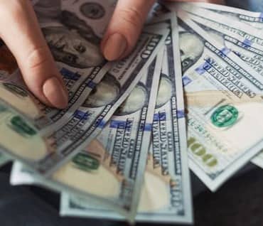 fan of 100 U.S. dollar banknotes