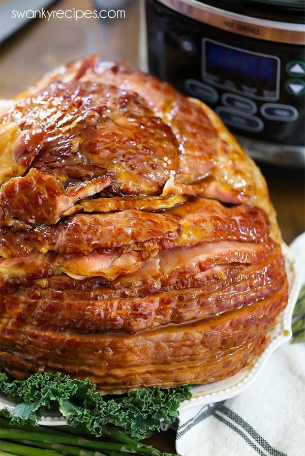 Slow-cooked ham with a caramelized brown sugar and pineapple glaze, ready to serve.