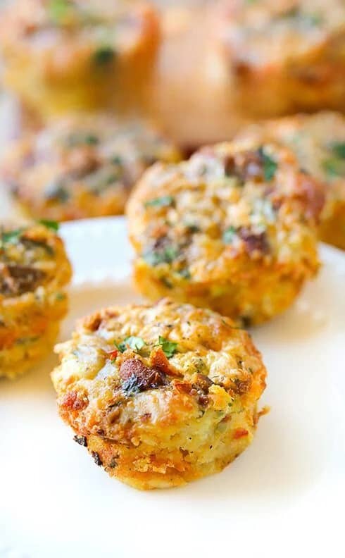 Close-up of hash brown egg muffins, seasoned with herbs and baked to perfection.