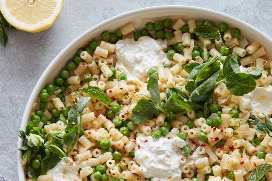 Crispy Chicken Thighs with Smashed Peas from www.whatsgabycooking.com (@whatsgabycookin)