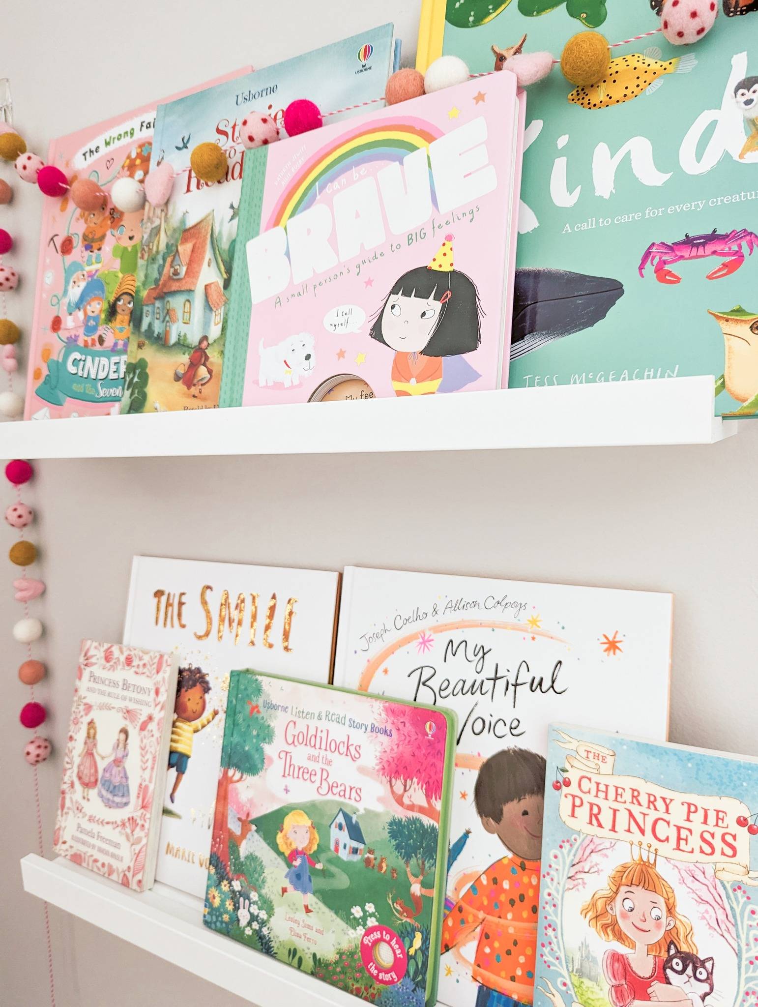 Display books within reach and covers facing outward