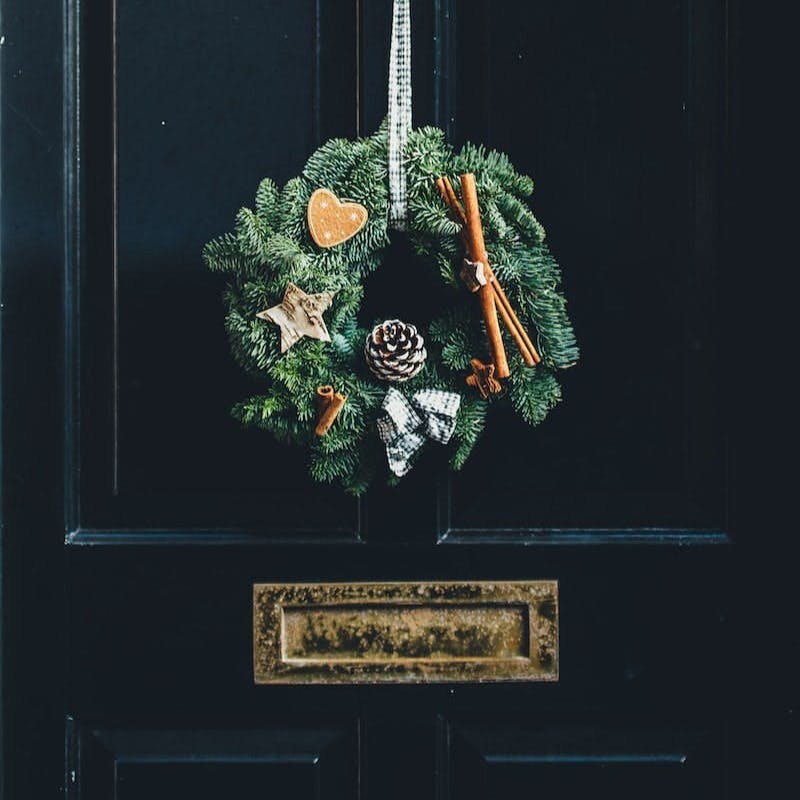 green wreath hang on door