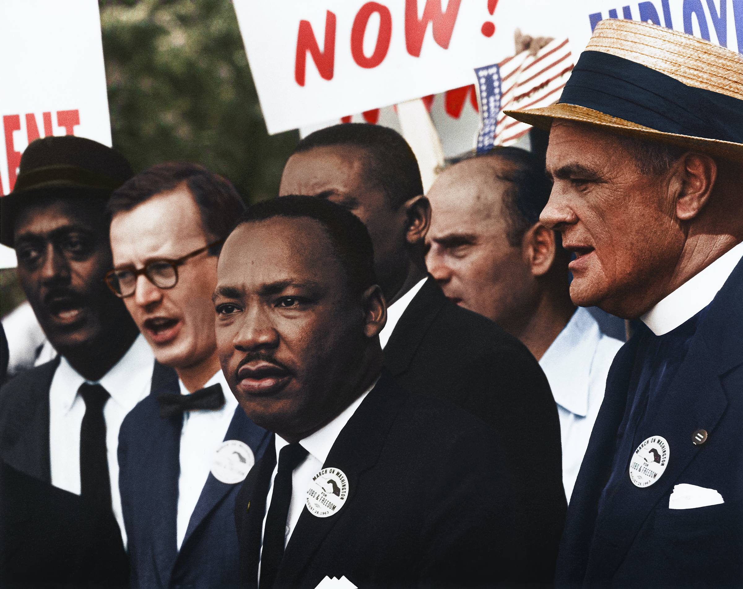Colorized photo of Dr. Martin Luther King, Jr. and Mathew Ahmann in a crowd at the March on Washington for Jobs and Freedom. August 28, 1963.