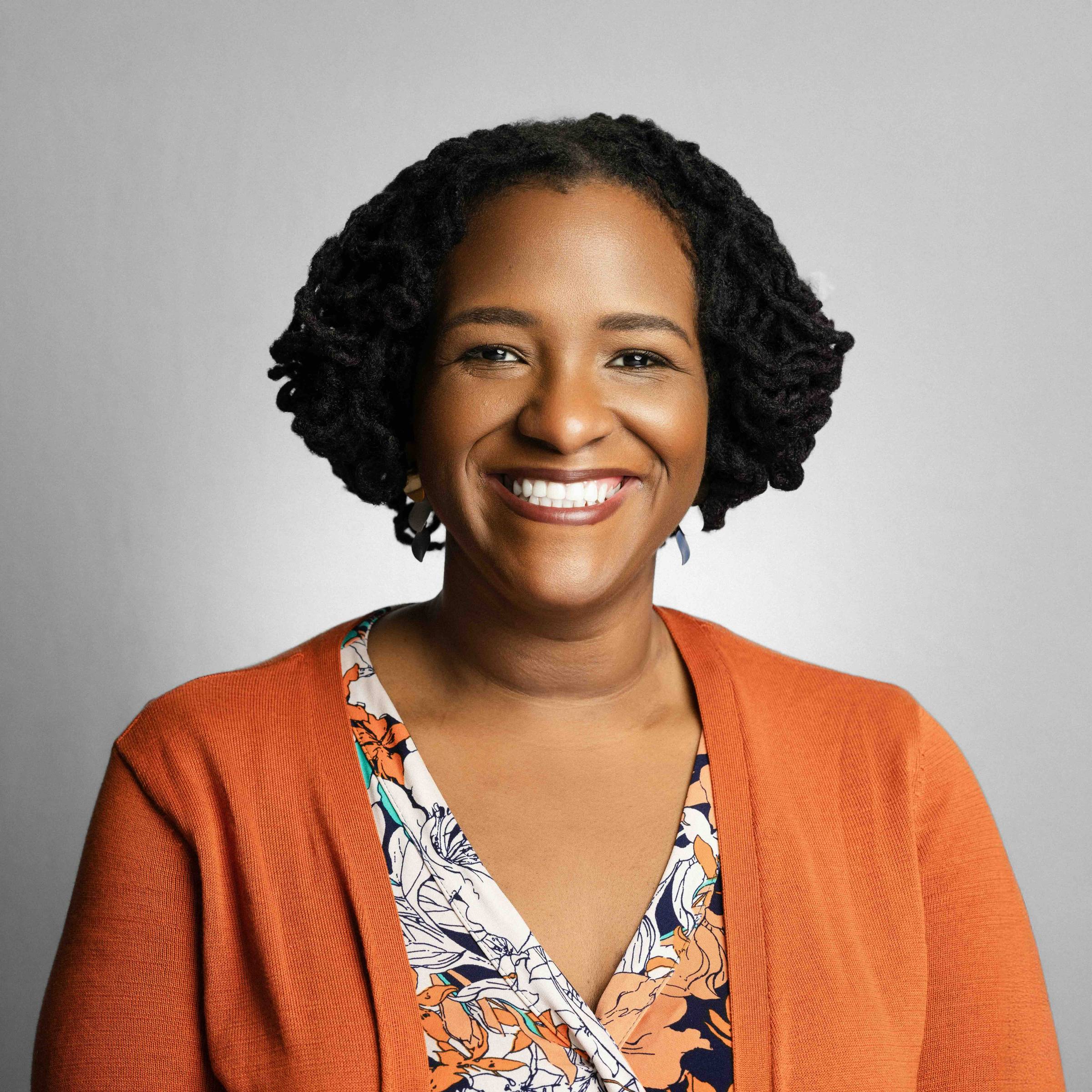Image of Thomas Tobin, associate dean and professor, smiles warmly while highlighting Black women's experiences in public health and equity leadership.