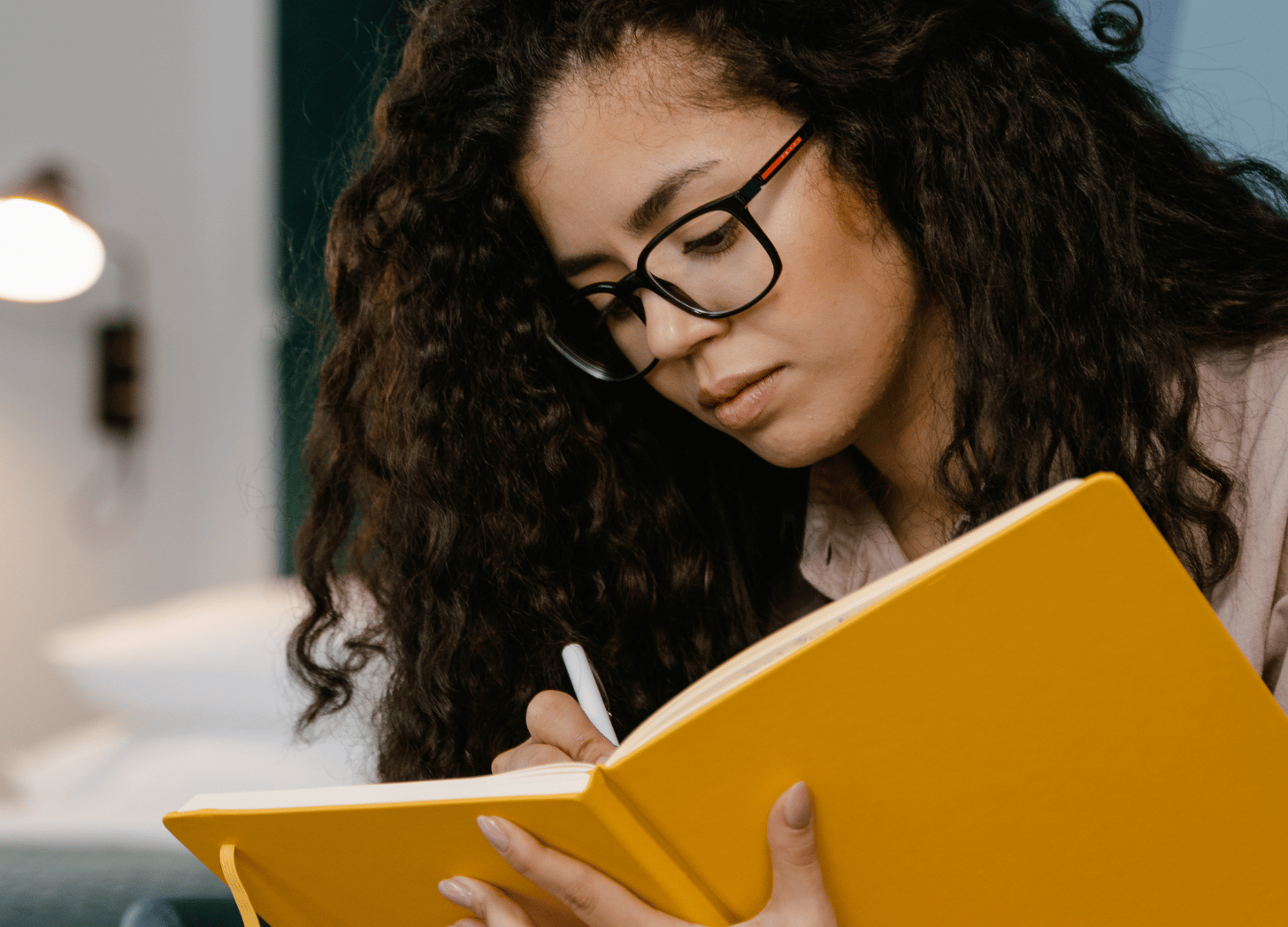 young woman journaling