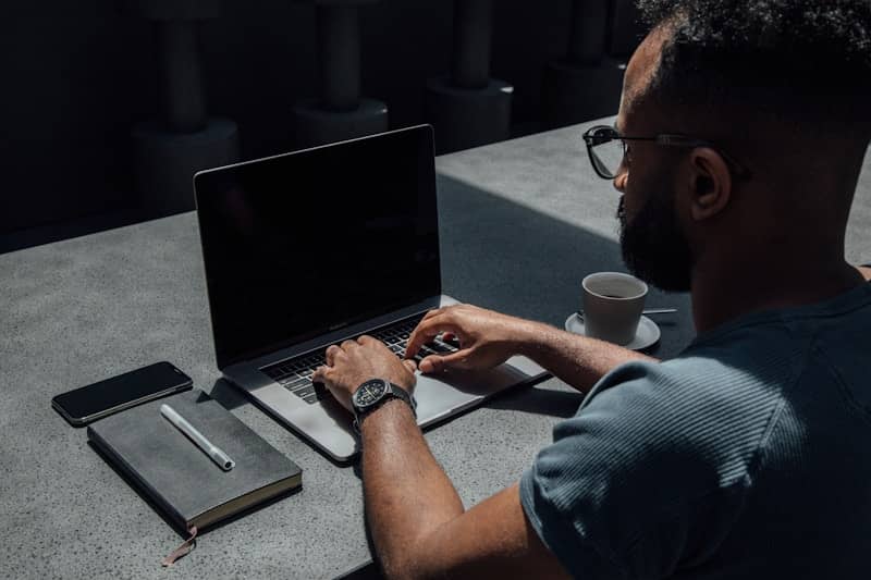 man using laptop computer