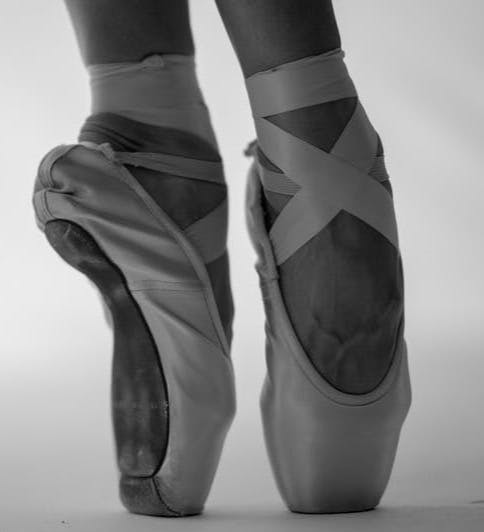 person in ballet shoes