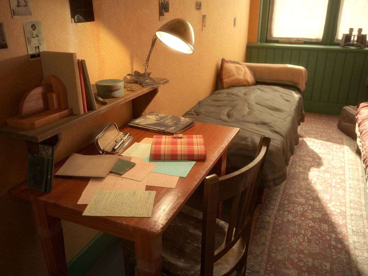 Anne Frank's bed, desk and diary in the secret annexe.