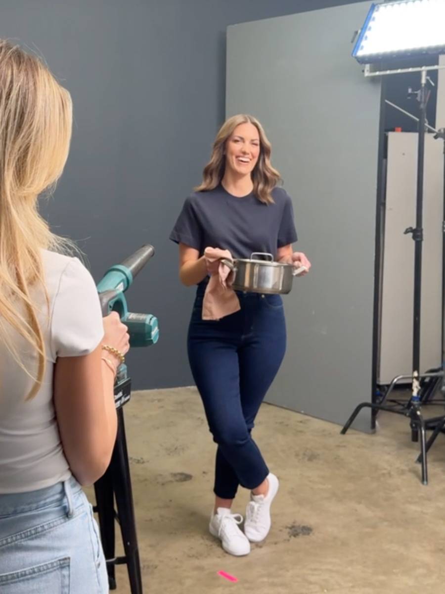 Nicole cooking during a photoshoot