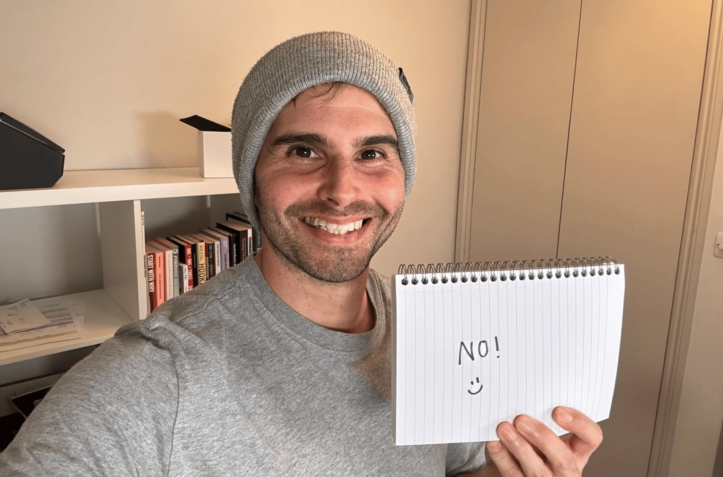 Me holding a sign saying NO.