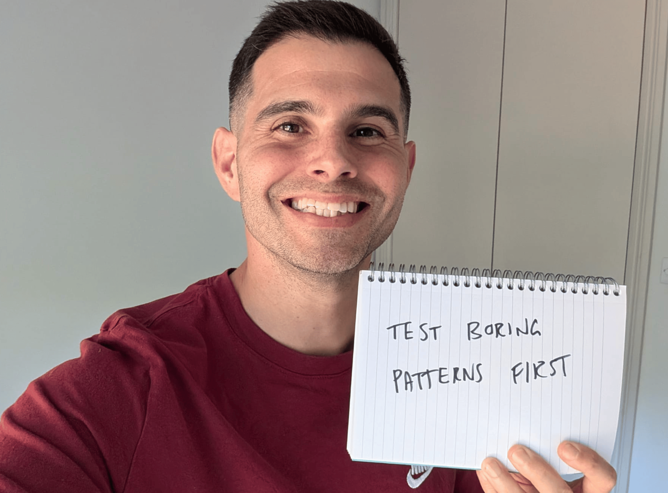 Me holding a sign saying "Test boring patterns first."