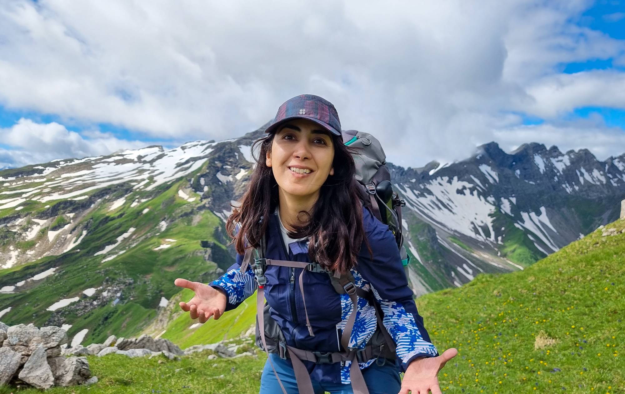 Mansoureh hiking in the mountains with her backpack