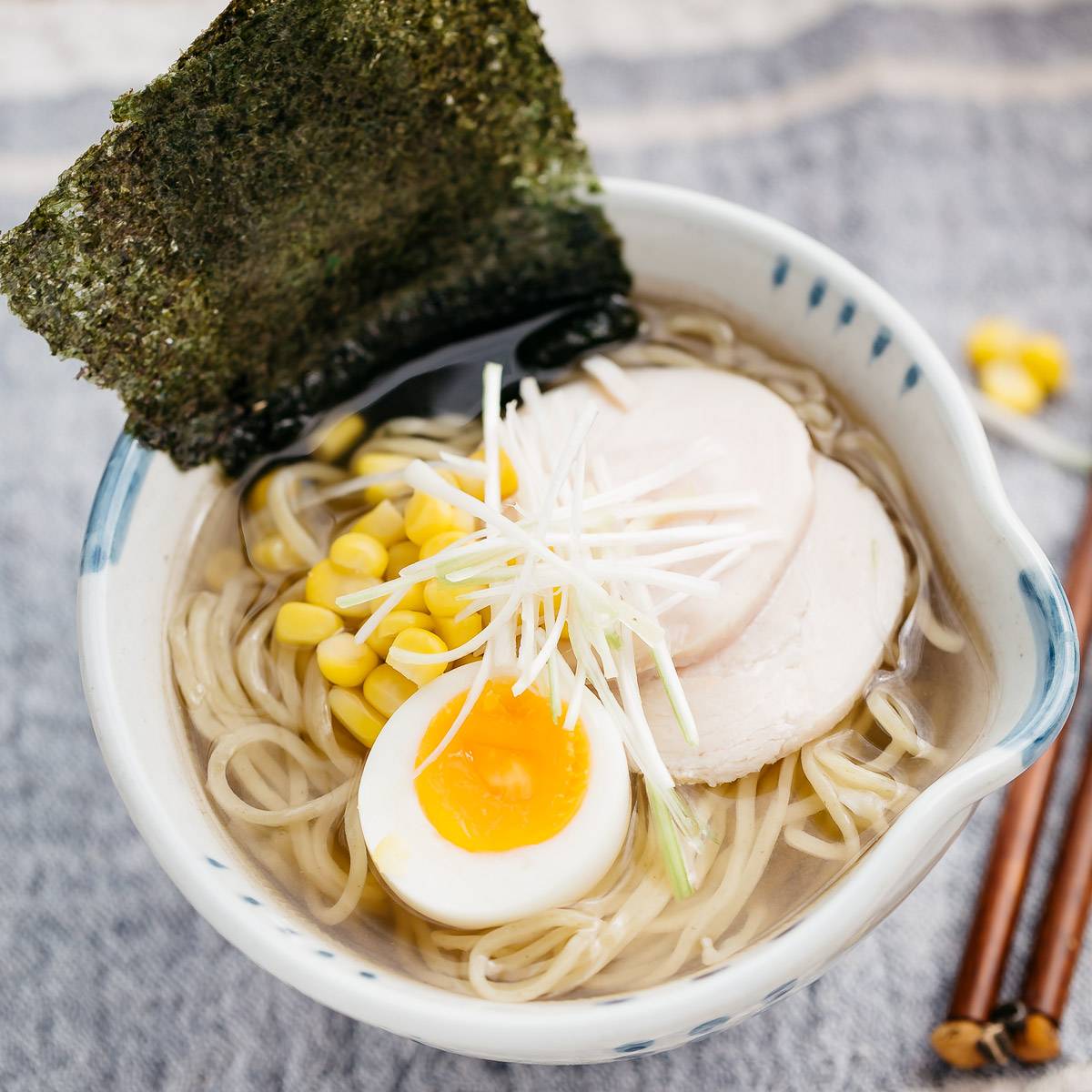 Shio Ramen served in a Japanese noodle bowl with a pair of chopstick