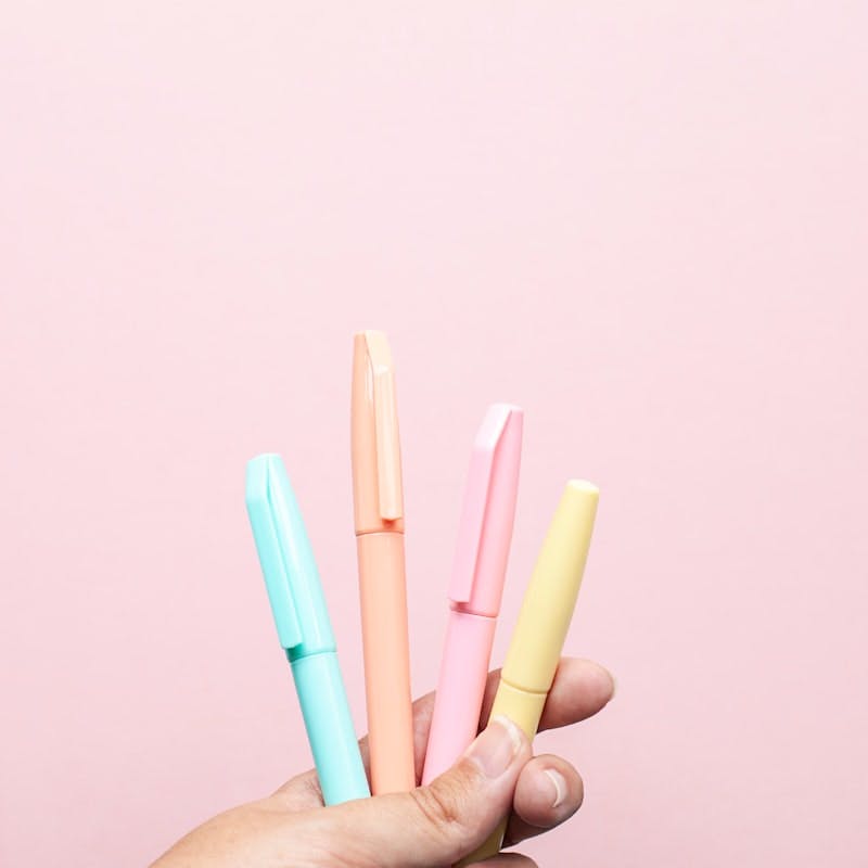 four assorted-color pens