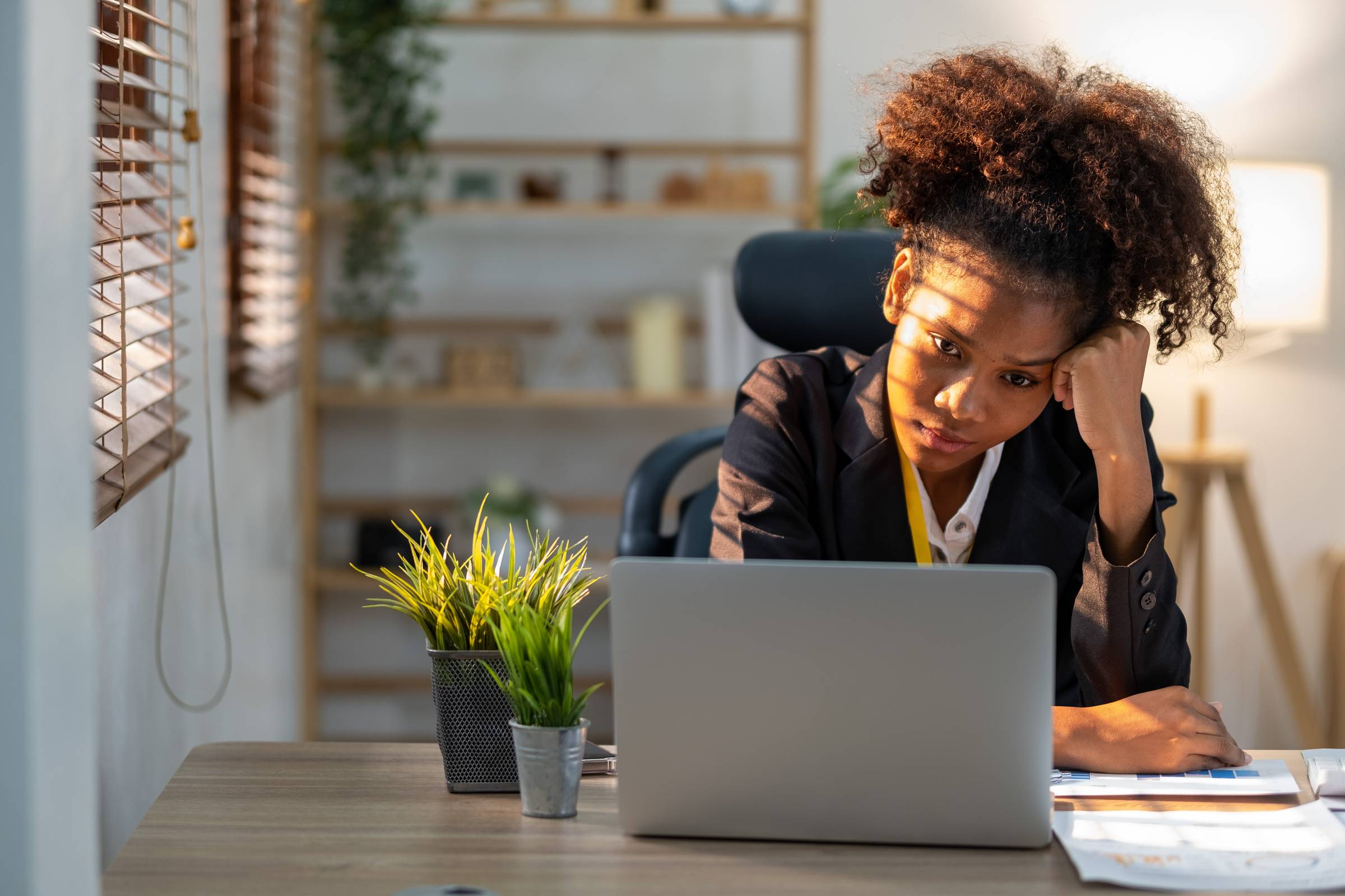 Young woman black employee feeling tired stressed concern nervous serius with her work in the office, sad working woman overworked overtime