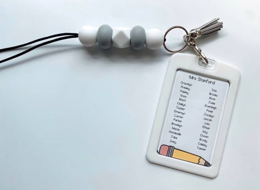 Editable lanyard class list printed and slipped into a teacher's badge holder