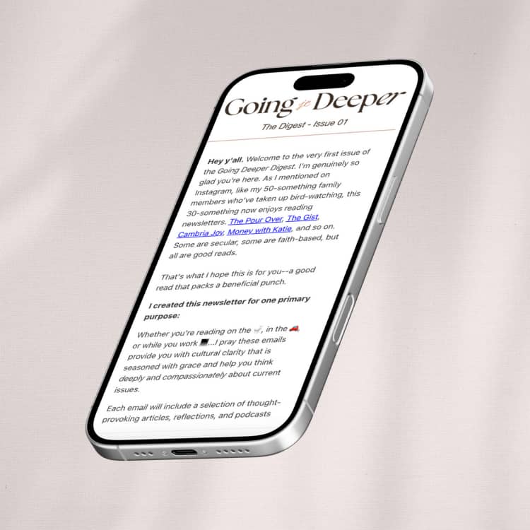 Someone is holding a stack of newspapers.