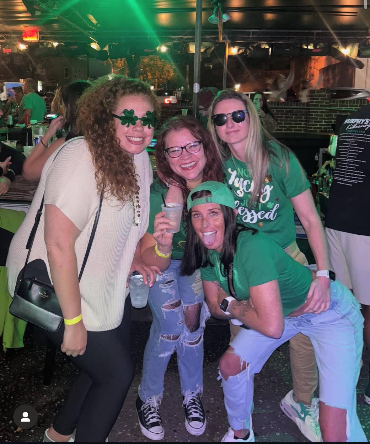 Aireanna caught mid-laugh with 3 girl friends in St. Patty's day outfits