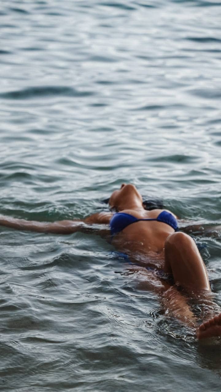 Image of a woman floating in the ocean