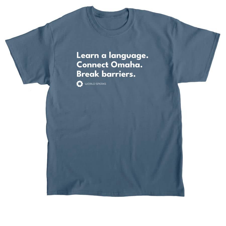 Blue t-shirt reads "Learn a language. Connect Omaha. Break barriers." 