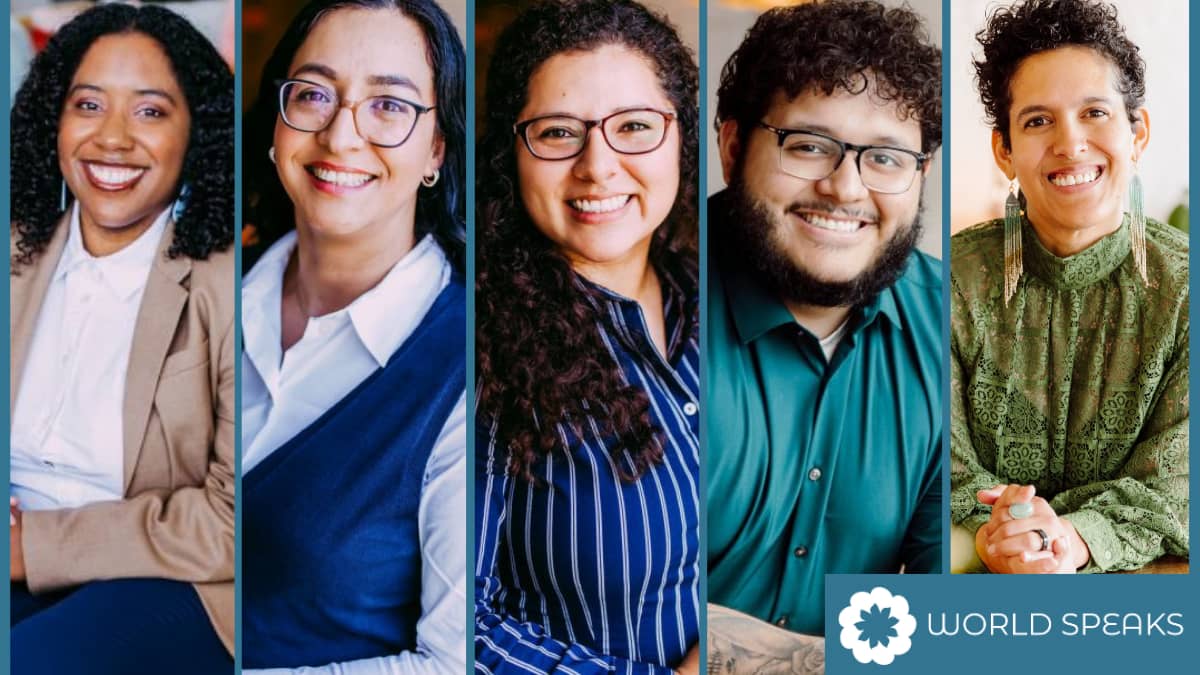 Five smiling individuals are pictured in vertical portrait panels, each with a warm, friendly expression. They wear business casual attire in a variety of styles and colors. At the bottom right, the World Speaks logo is visible, featuring a blue flower em