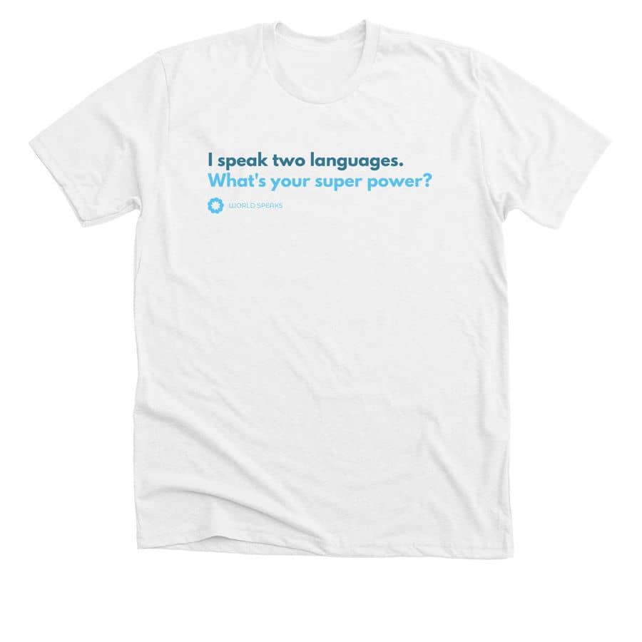 A white t-shirt with blue lettering that reads "I speak two languages. What's your superpower?" 