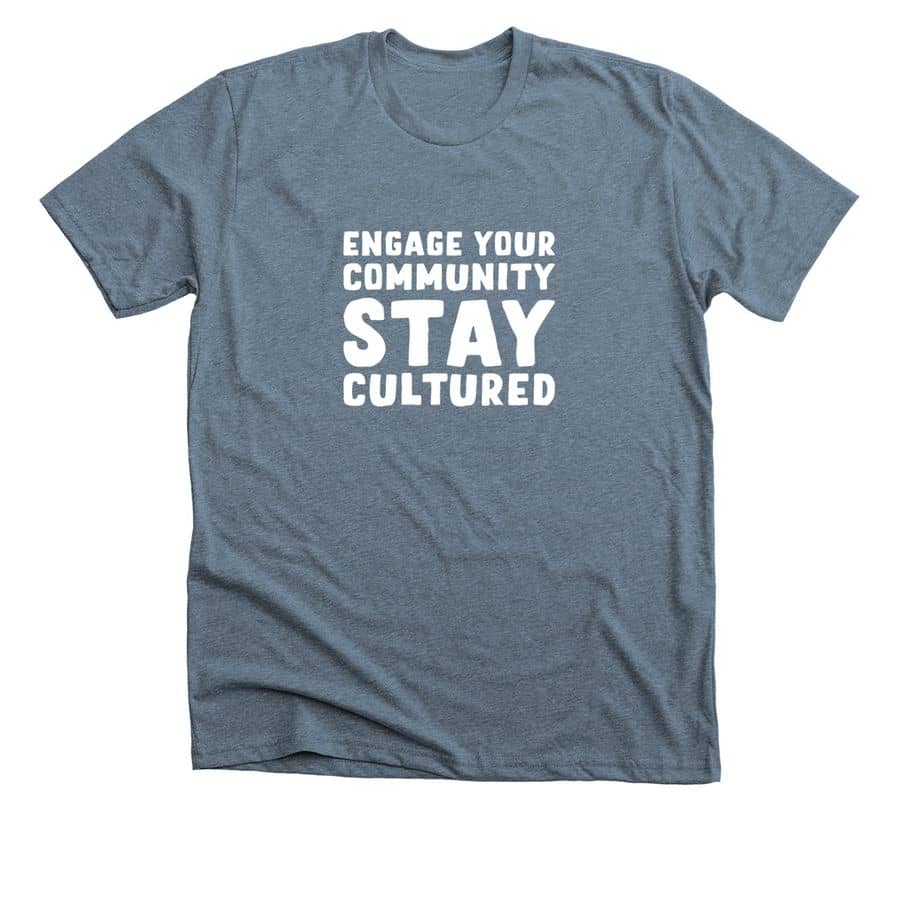 Image is a blue shirt that says "Engage Your Community, Stay Cultured" 